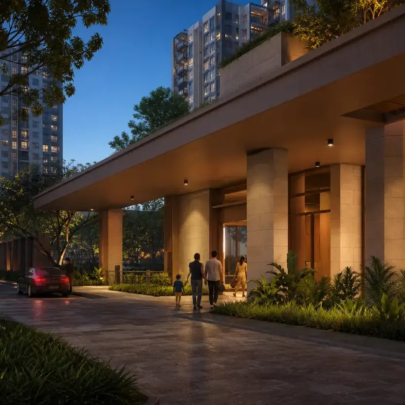 My Home Hoskote, artistic impression A residential arrival court with a lit porch at dusk